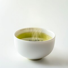 a white ceramic cup filled with steaming green tea, soft green hue visible in liquid, minimal design, isolated on white background, soft lighting, clean and healthy product aesthetic