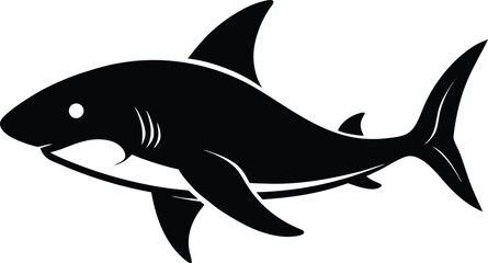 Silhouette of a shark swimming in the ocean