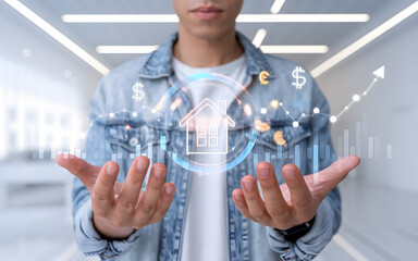 Man holds a holographic home icon representing real estate investment growth. AI Generated 