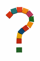 Colorful Wooden Blocks Arranged to Form a Question Mark Symbol on a Stark Black Background