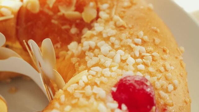 Cake Roscon de reyes. A traditional pastry prepared and served on the Feast of the Three Kings or Epiphany in Spain and Latin American countries. High quality 4k footage