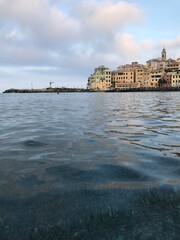 Early morning mist drifting above the coastal hills.
