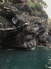Golden glow on the Italian seaside at dawn.
