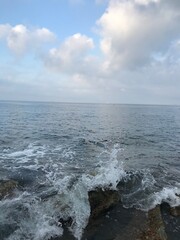 Blue sea stretching toward the distant horizon.
