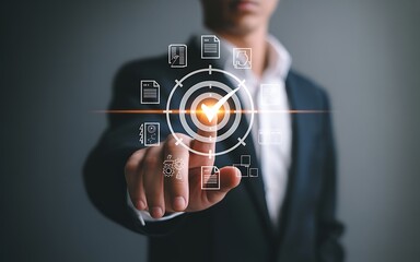 Businessman interacting with a virtual interface, touching a glowing target icon. Business concept for objective setting, strategic planning, and success.