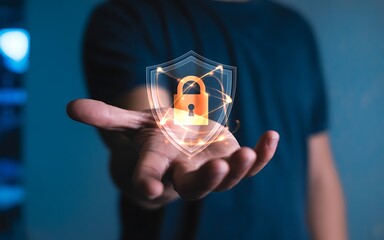 Cybersecurity concept with a person holding a holographic shield and padlock icon. Digital data protection, network privacy, and internet safety.