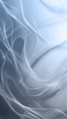 Fototapeta premium Abstract flowing light streaks and wisps on a soft blue background