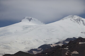 two-headed Elbrus from the upper station of the cable car in the middle of summer