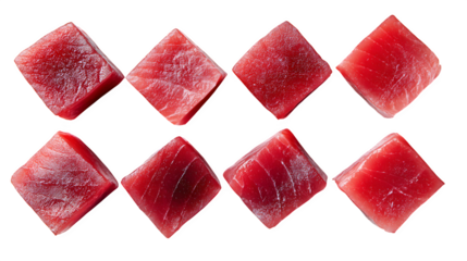 Cubes of raw tuna meat arranged neatly on a white background