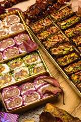 Sweet food Turkish delight on wooden background, assorted locum and candy for decorated backdrop