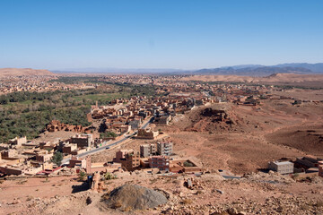 Morocco - panoramic view on the Tinghir oasis, large area with palm trees and the town.  North Africa
