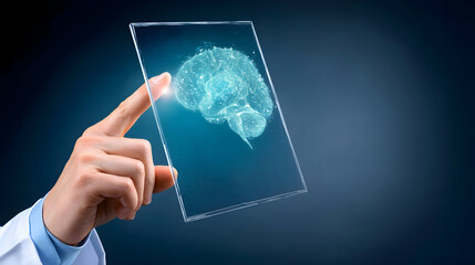 A hand interacts a transparent tablet displaying a digital rendering a human brain.
