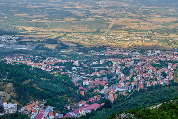 Wide panoramic view of valley and countryside from mountains
