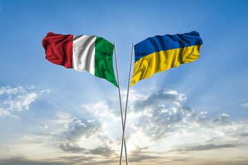 Waving National flag of Ukraine and flag of Italy for international unity