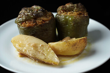 Green peppers stuffed with rice tomato and herbs