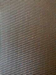 Woven textile in a minimalist style in brown and beige colors, representing texture and natural materials for background use with copy space