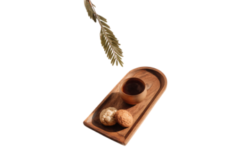 A wooden tea tray with cookies and coffee on it, simple background, white space in the middle of the picture, product photography, front view isolated on a transparent background in PNG format.