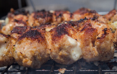 Stuffed meat rolls roasted on the grill