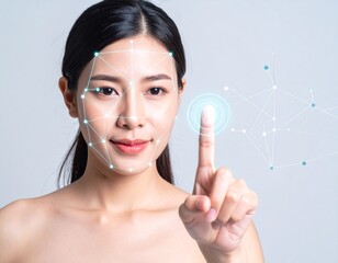 Young Asian woman with a digital overlay on her face for biometric scanning and facial recognition, touching a virtual interface.