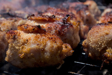 Stuffed meat rolls roasted on the grill