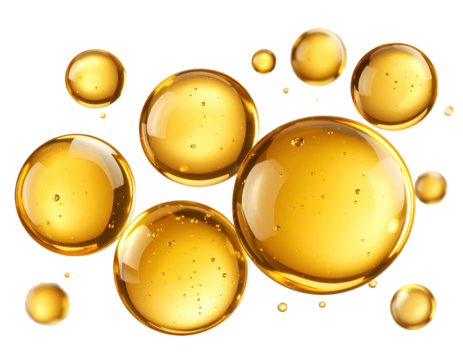 Floating golden oil bubbles with glossy highlights, isolated on a transparent background.
