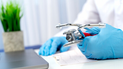 Times behind a laptop with a statscope