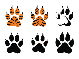 Fototapeta premium Tiger Paw Prints: a selection of vibrant tiger paw prints, showcasing the distinctive patterns of this majestic feline. this collection includes both striped and solid impressions.
