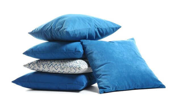 Stack of decorative pillows against white background