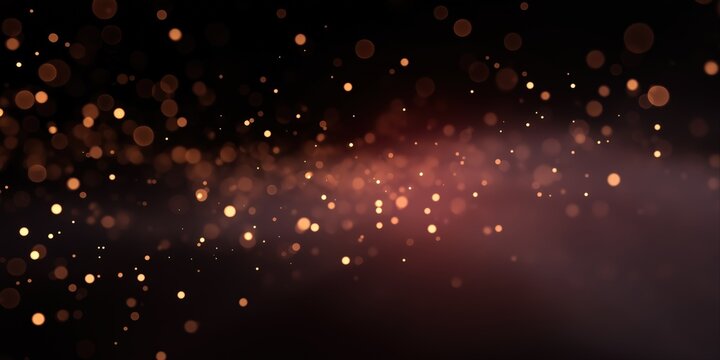 Magical bokeh lights on dark background with warm glow