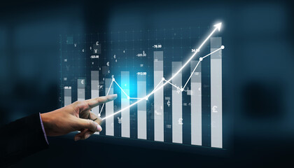 A business professional hand points at a digital graph showcasing financial growth with bars and a line chart, illustrating effective trend analysis and performance metrics. Impute