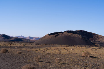 Volcanic Serenity Under Clear Skies