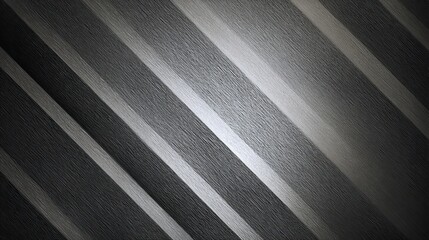 Fototapeta premium Dynamic diagonal stripes in shades of grey create a modern textured background perfect for sophisticated design projects