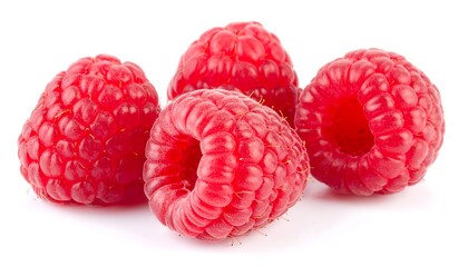 Close-up of four fresh raspberries
