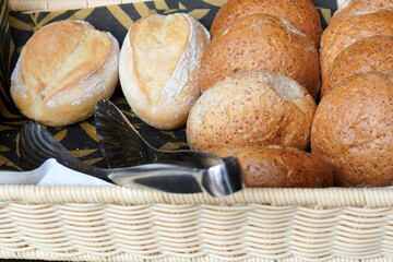 Sliced fresh breakfast buns in a basket