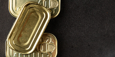 Can tin canned food fish or meat, tin can vegetable fresh delicious gourmet food background on the table rustic food top view copy space