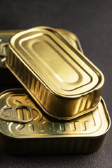 Can tin canned food fish or meat, tin can vegetable fresh delicious gourmet food background on the table rustic food top view copy space