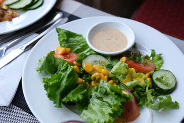 salad with fresh leaves and corn dip in sauce cucumbers tomatoes fresh tasty food diet. High quality 4k footage