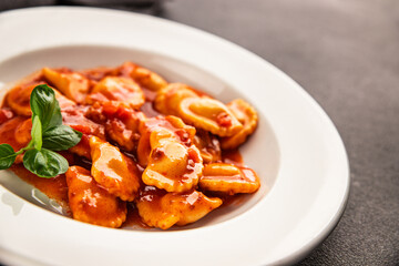 Ravioli beef tomato sauce second course fresh delicious gourmet food background on the table rustic food top view copy space