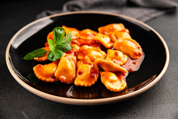 Ravioli beef tomato sauce second course fresh delicious gourmet food background on the table rustic food top view copy space