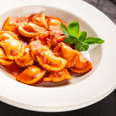 Ravioli beef tomato sauce second course fresh delicious gourmet food background on the table rustic food top view copy space