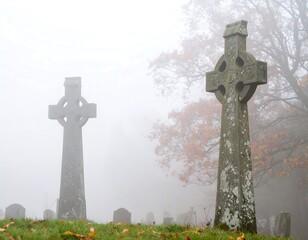 Foggy cemetery scene with Celtic crosses