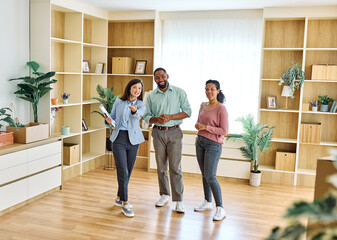 Female Real Estate Agent Selling And Showing The Modern Apartment To His Young Clients That Are...
