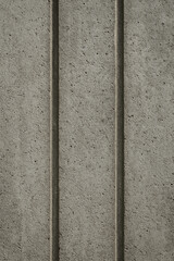 Fototapeta premium Textured Concrete Wall Surface with Vertical Grooves – Minimal Background (AI Generated) 
