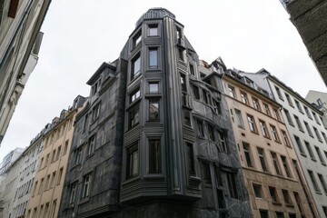 Fototapeta premium In a picturesque urban alleyway in Germany, striking modern architecture vividly contrasts with the surrounding traditional buildings as twilight descends