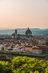 Fototapeta premium Shot of Duomo, Cathedral of Santa Maria del Fiore in Florence, Firenze, Tuscany, Italy at warm golden hour in summer