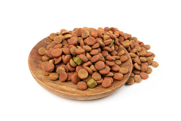 Dry pet food, dog color kibble pile, puppy meat and vegetable pellets, canine protein granules