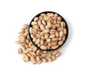 Fried salt pistachio nuts isolated. Baked pistachios pile, roasted green pistache fruit in shell on white