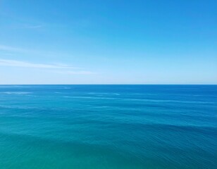 Vast ocean meets clear sky