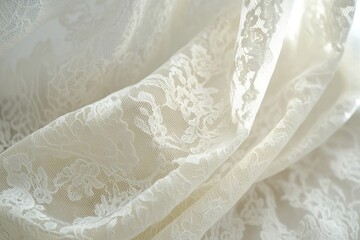 Obraz premium Close-up shot of delicate, flowing white lace fabric with floral patterns, creating a soft, elegant, and romantic textile.