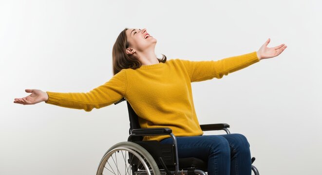 Embracing Freedom: A woman in a wheelchair raises her arms in a moment of triumph, embodying resilience and liberation from constraint. - Powered by Adobe